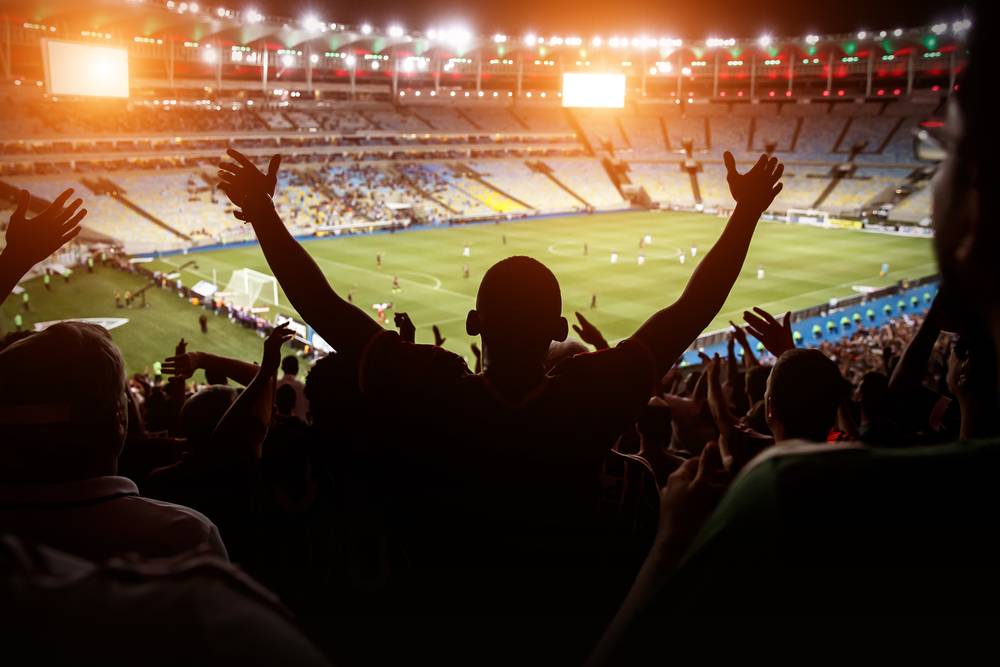 Football, soccer fan support their team and celebrate goal, score, victory. Black silhouette.