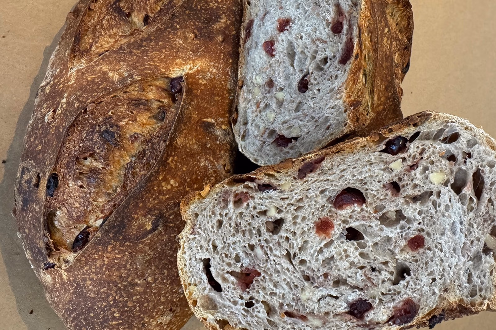 690d1bee262fa71880c227c8_Barrio_Bread_Cranberry_Walnut-1-Large - Explore Dine Play
